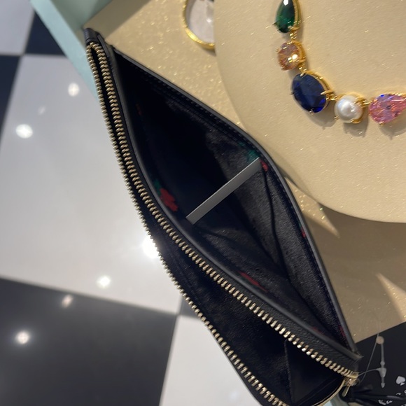Kate Spade Lucy Medium L-Zip Wristlet
COLOR:
Black Multi
NWT - Picture 16 of 16